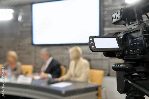 Photo: Camcorder at a news conference. Camcorder at a news conference.