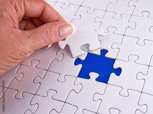 Photo: Puzzle mit Hand - Performance Concept Puzzle mit Hand - Performance Concept