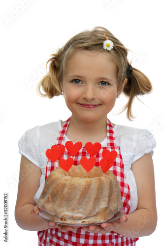 Foto: Mädchen hält einen Kuchen 1 Mädchen hält einen Kuchen 1