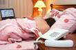 One sleeping man in the bed from back view