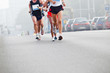 Photo: People running in city marathon People running in city marathon