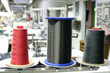 Fadenspulen in der Kleiderfabrik