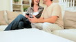 Young Couple Relaxing with a Glass of Wine