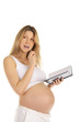 pensive pregnant woman with a notepad pensive pregnant woman with a notepad