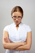 Portrait of business woman with crossed arms