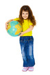 Cheerful little girl in jeans with a geographic globe Cheerful little girl in jeans with a geographic globe