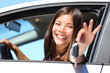 Girl car driver showing keys