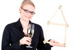 junge Frau mit Haussymbol und Sektglas