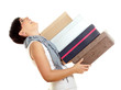 Foto: Pretty woman has fun to carry a lot of shoes Pretty woman has fun to carry a lot of shoes