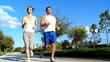 Young Couple Jogging on Suburban Roads