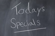 Blackboard with words "todays specials" written on it