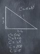 Right triangle with pythagorean formula and calculations on a bl