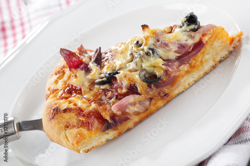 Photo: Pizza closeup Pizza closeup