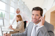 Photo: Businessman talking on the phone Businessman talking on the phone