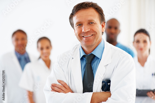 Photo: Mature doctor smiling Mature doctor smiling