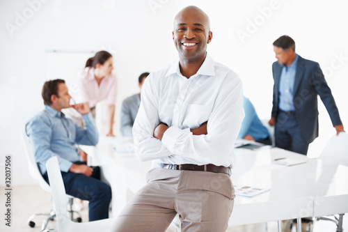 Photo: Business man smiling Business man smiling