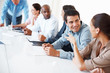 Photo: Colleagues discussing during meeting Colleagues discussing during meeting