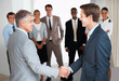 Agreement - Business handshake between two men