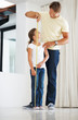 Young girl getting her height measured