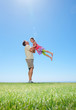 Man picking up his daughter