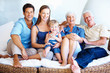 Family sitting on a sofa