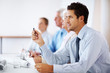 Business man paying attention in seminar Business man paying attention in seminar