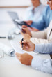 Checking financial figures during a meeting
