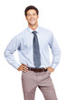 Happy young business man standing confidently