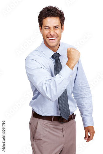 Photo: Successful young executive gesturing a strong business competiti Successful young executive gesturing a strong business competiti