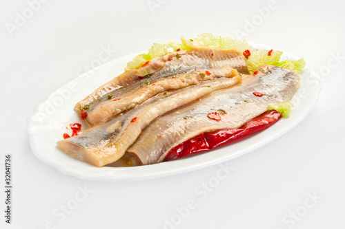 Photo: Herring on the white background Herring on the white background