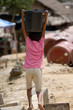 Child carrying water