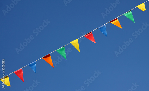 Photo: Fähnchen an der Leine im blauen Himmel Fähnchen an der Leine im blauen Himmel