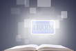 open book and button