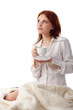 Photo: .Young woman with cup of coffee. .Young woman with cup of coffee.