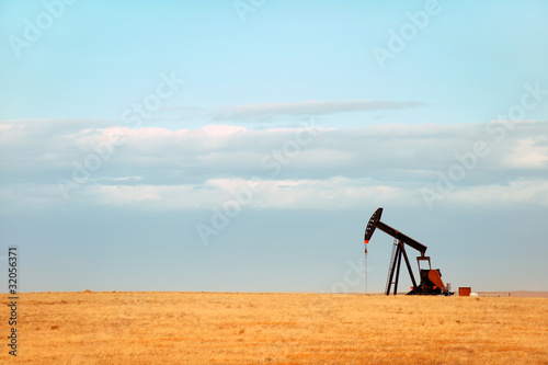 Photo: Working oil pump on Nebraska Great Plains Working oil pump on Nebraska Great Plains