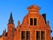 Bruges, tower and gable at dusk, artificially illuminated