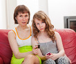 Mama with daughter listening music