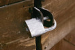 Iron lock on wooden door