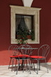 Empty metallic chairs on a cafe terrace in Sibenik