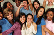 excited and happy group of diverse young people cheering