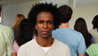 Mobbing, discrimination or racism: Man and crowd