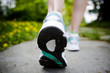 Photo: Woman walking cross country and trail in spring forest Woman walking cross country and trail in spring forest