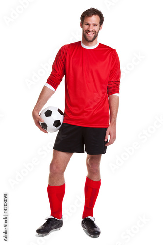 Photo : Footballer cut out on white Footballer cut out on white