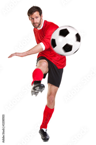 Photo: Footballer cut out on white Footballer cut out on white
