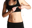 fit lady measuring her bust