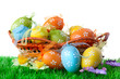 color easter eggs in basket isolated on white