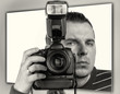 Photo: Photographer with the camera portrait Photographer with the camera portrait