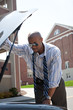Man with a Broken Down Car