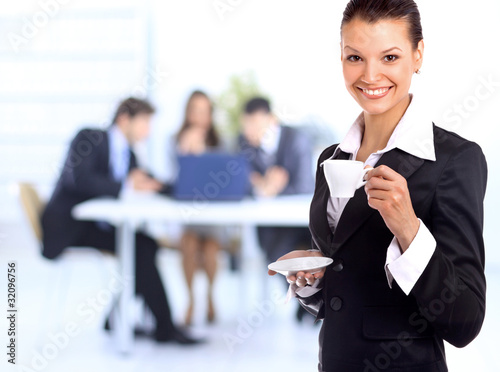 Photo : business woman with cup of coffee.. business woman with cup of coffee..