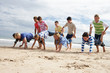 Photo: Teenagers playing on beach Teenagers playing on beach